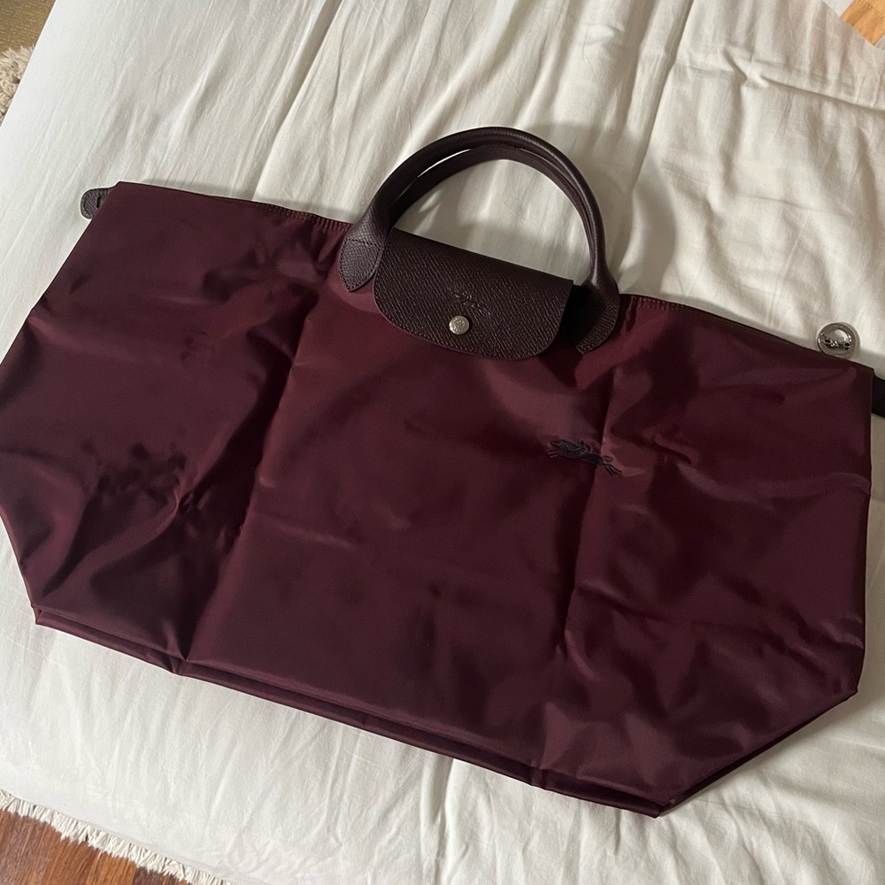 Longchamp Le Pliage travel weekender tote